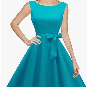 NWOT. Turquoise cocktail dress. Vintage look.